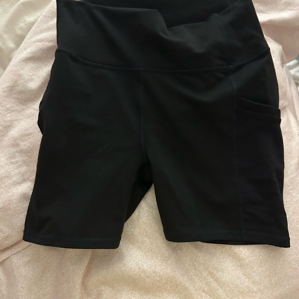 Fabletics Powerhold Black High-Rise Athletic Bike Shorts with Side Pockets